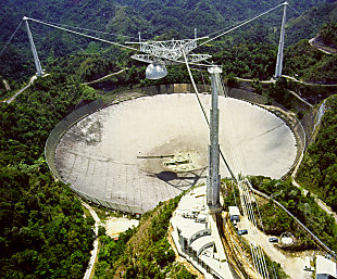 Arecibo Observatory, a 305-meter-wide radio telescope (courtesy of the NAIC - Arecibo Observatory, a facility of the NSF)