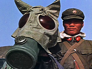 A Chinese soldier and his horse prepare to participate in exercises during a nuclear test